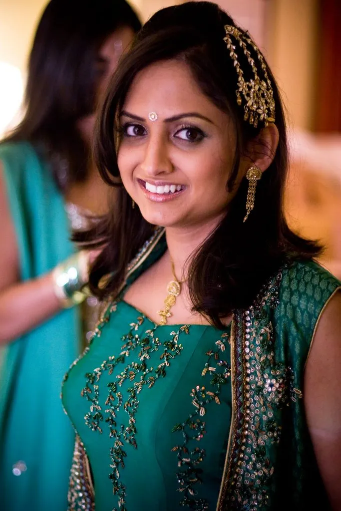Wedding guest makeup and hairstyle styling for destination wedding event
